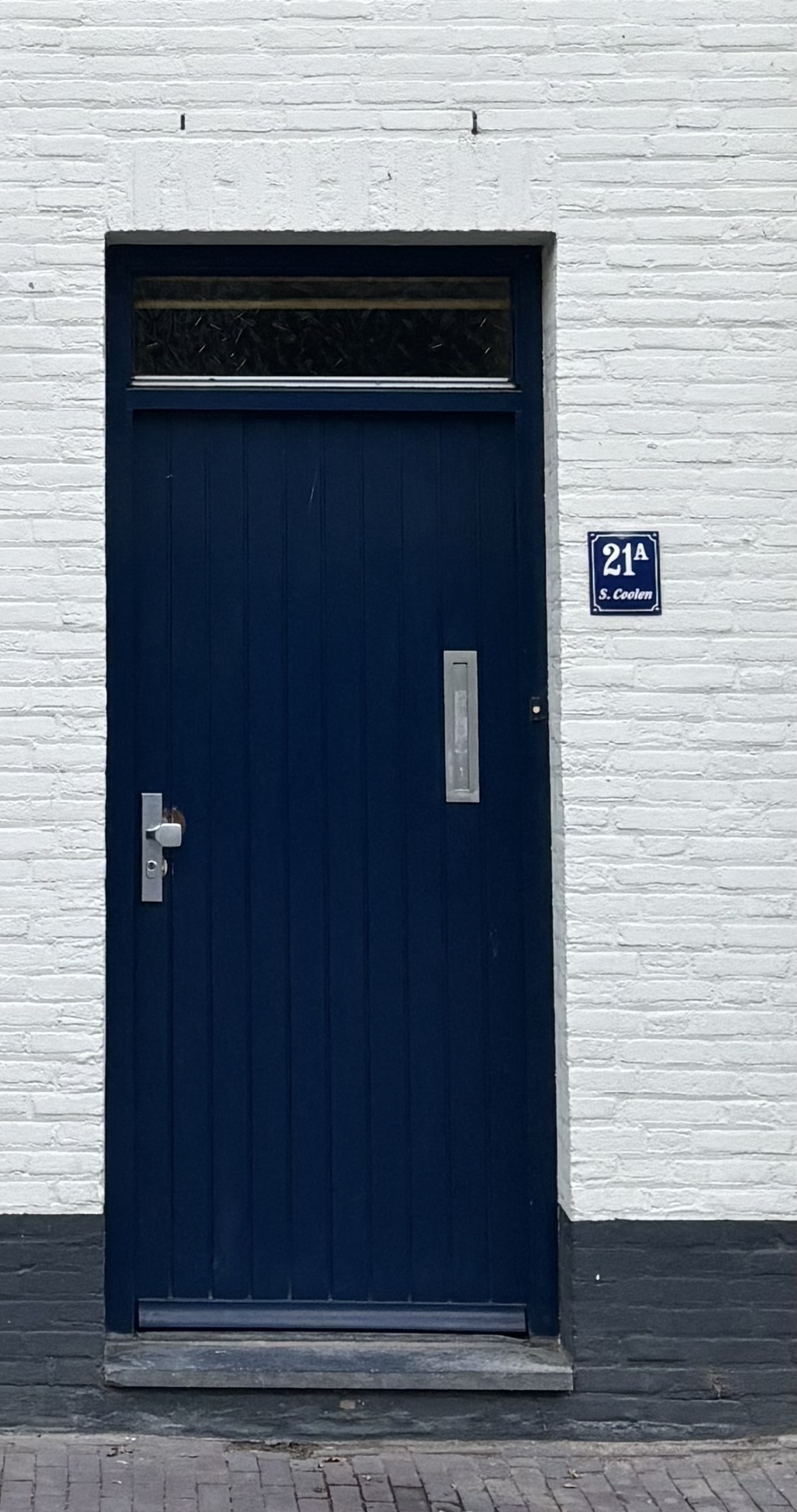 Huisnummer met naam met kader