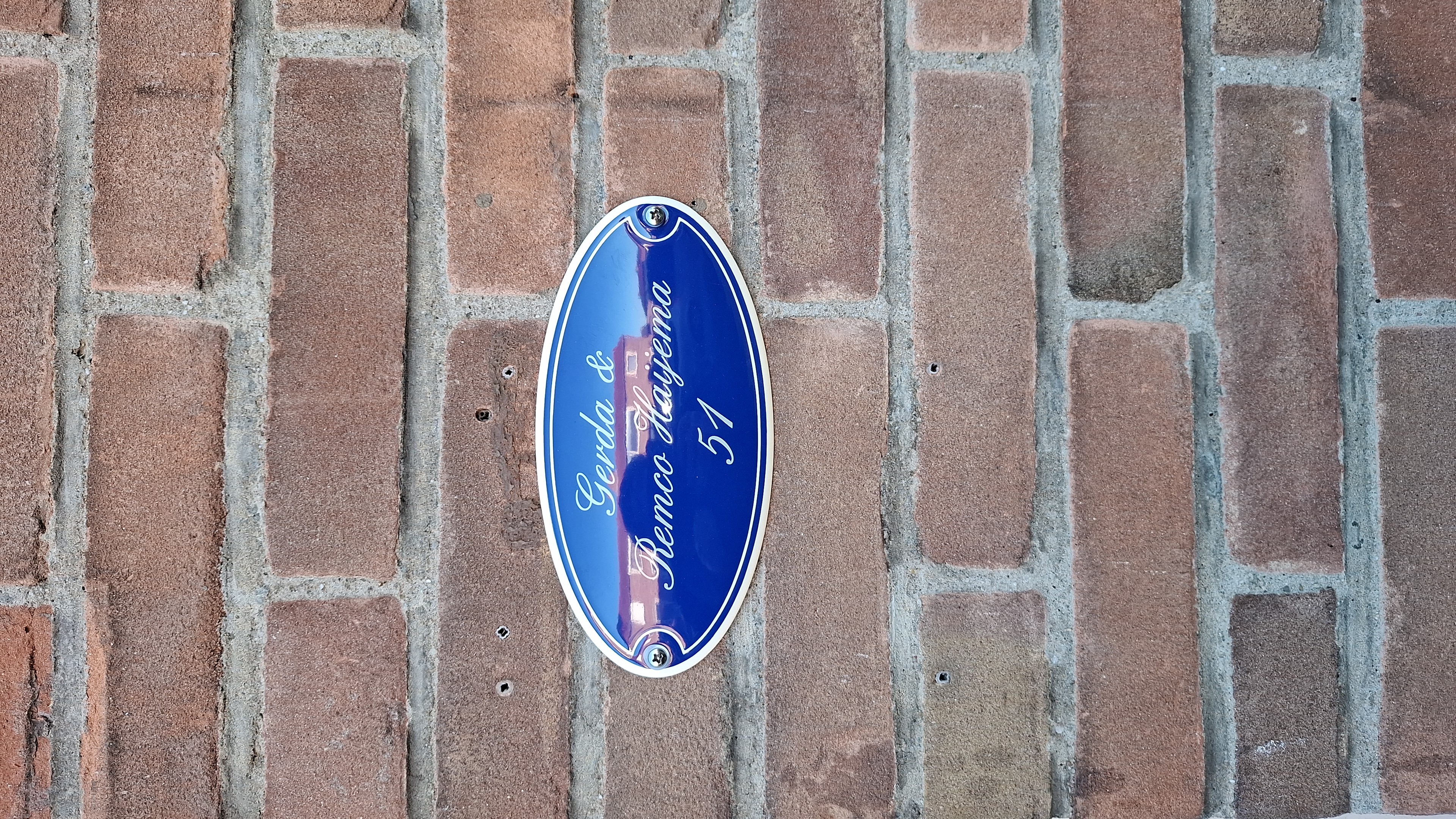 Naamplaatje gebold met rand + kader ovaal